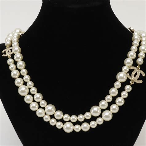 chanel gold diamond necklace|chanel pearl long strand necklaces.